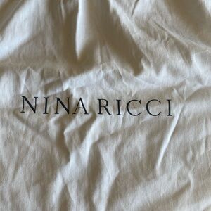Nina Rocco dust bag